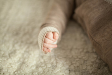 handle the baby in a warm sweater