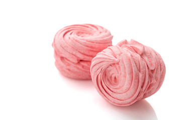 Homemade pink zephyr or marshmallow isolated on white