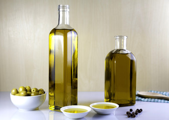 Two bottle olive oil with olive bowl