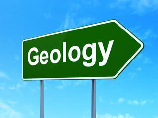 Science concept: Geology on green road highway sign, clear blue sky background, 3D rendering