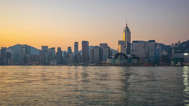Timelapse video of Victoria Harbour skyline night to day in Hong Kong city, Hong Kong Time Lapse 4K