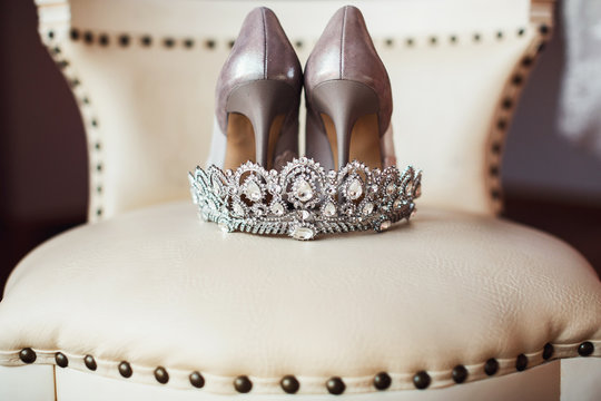 silver crown and bridal shoes