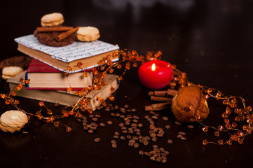  festive mood with cookies cinnamon sticks and books and coffee grains create a wonderful mood