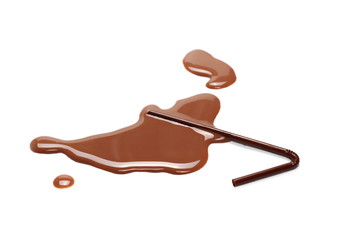 Spilled chocolate milk puddle with drinking straw isolated on white background