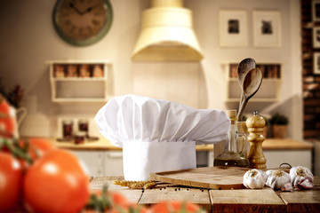 Fototapeta na wymiar cook hat and kitchen space 