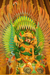 Bali island. Garuga god on a gable, or fronton of traditional balinese hinduist temple. Decoration element.