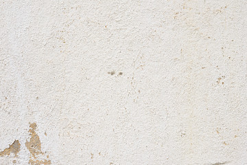 Wall fragment with scratches and cracks