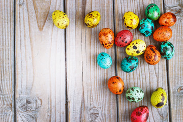 Colored easter eggs on a light background,place for text