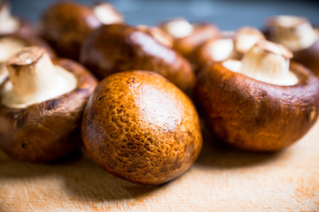 Fresh mushroom on the table. Selective focus.