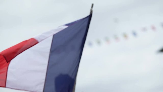 Patriots waving national flag of France, supporting sports team at competition