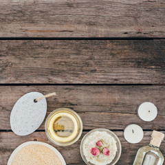 top view of oil, salt, pumice and spa treatment on wooden table