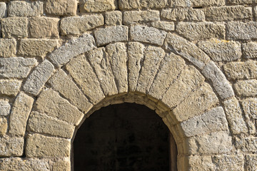 semicircular arch at the entrance of a small chapel Romanesque architecture style. half-point arch