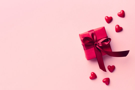 Red Gift Box On Pink Background