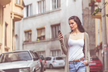 Cute urban girl talking on the phone.