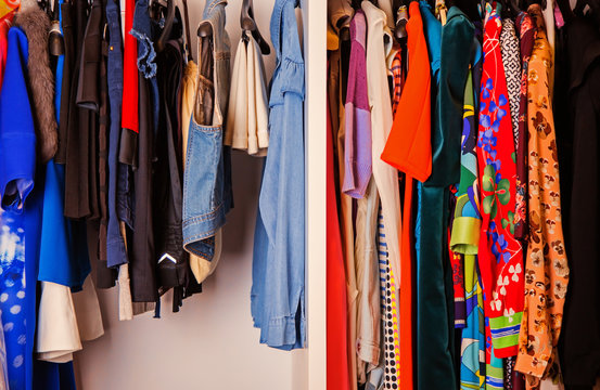 Colorful collection of women's clothes hanging on a rack