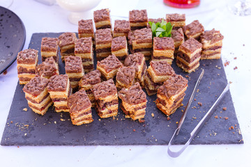 cakes on the banquet table are a tray