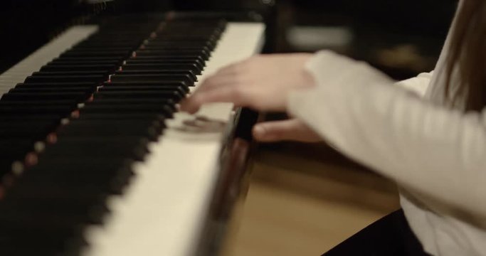 cute child girl play piano