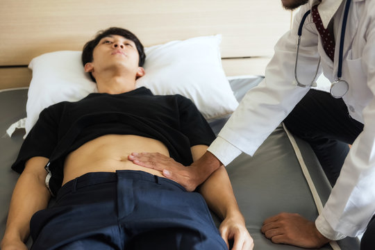 doctor check patient stomach, Rotavirus sick