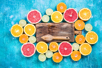 Halves of citrus fruits overhead, healthy eating