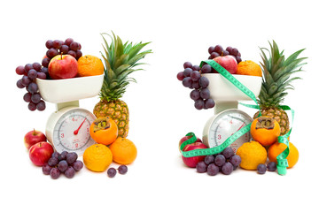 Fototapeta na wymiar fruit and kitchen scales isolated on white background