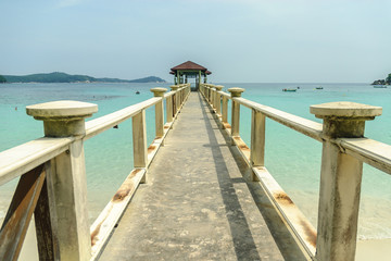 sight in perspective of a wharf in the island to Kiss in the islands Perhentian in Malaysia.