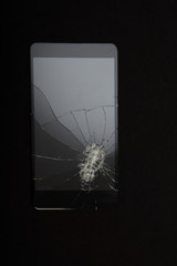 Close-up view of Shattered smartphone screen
