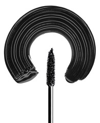 mascara brush paints a semicircle on a white surface