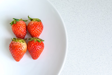 Strawberry on the plate, selective focus