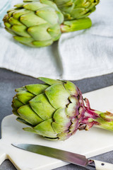 Green ripe raw artichokes ready to cook