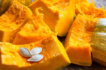 raw sliced pumpkin with seeds