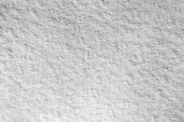 Obraz premium Texture of thick paper intended for watercolor painting. Macro snapshot of details of the relief paper structure