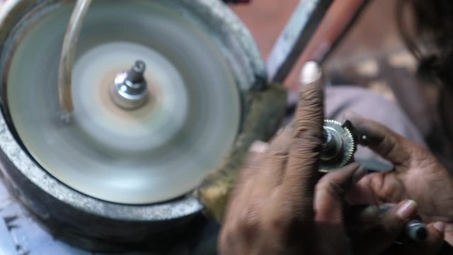 Lapidarist In Process Of Cutting And Polishing Gems. Closeup. 4K.