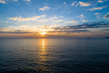 Naklejka na ściany i meble beautiful sunrise over sea from drone view