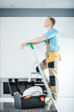 Black toolbox of electrician