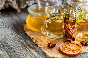 Herbal Christmas tea with honey and mint leaves