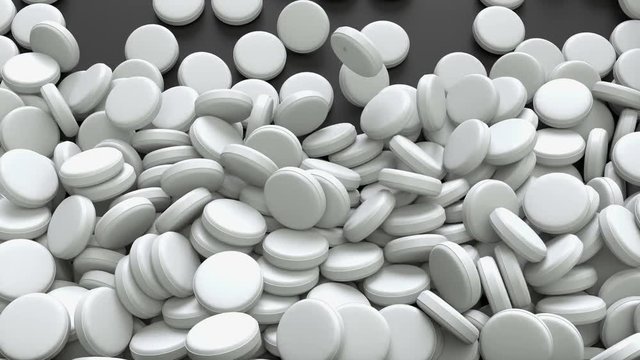 White round pills falling on dark surface.
Animation of large amount of tablets.