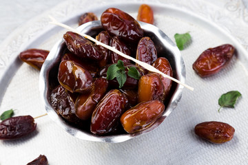 Dry fruit dates on silver tray.