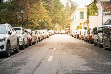 Cars parked on the urban street side