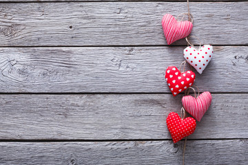 Fototapeta na wymiar Valentine day background, hearts bunch on wood