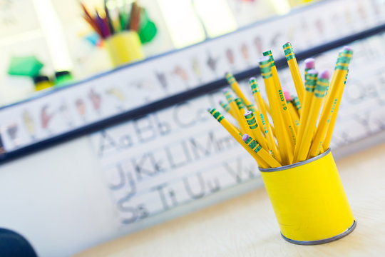 Pre-K and Kindergarten school work with pencils 