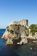 View of Fort Lovrijenac (St. Lawrence Fortress) on a steep cliff in Dubrovnik, Croatia, on a sunny...