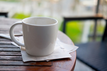 Close up white cup of hot coffee
