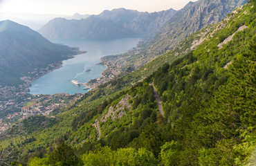 Fototapeta na wymiar A view of the ancient city of Kotor and the Boka Kotorska bay from the top of the mountain.