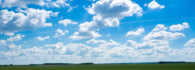 beautiful cloudy sky and the trace of the plane