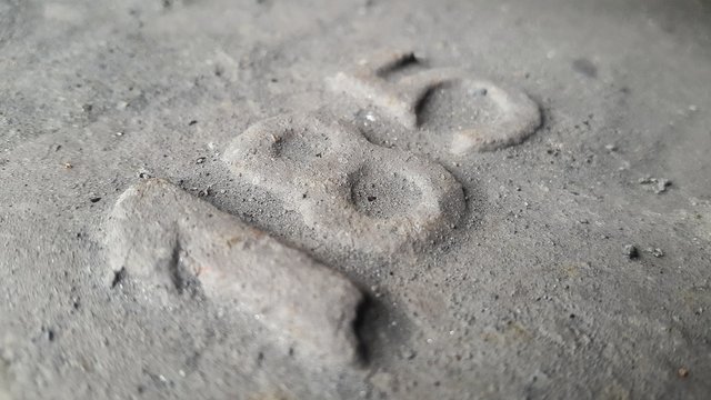 Metal number 185. Texture of rusty metal in the form of figures 185.