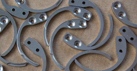 A large pile of tools to remove the security alarms used to prevent theft, usually in clothing....