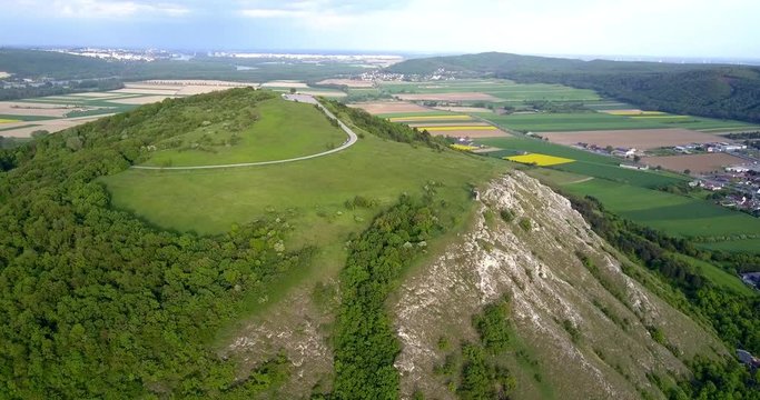 Beautiful scenery and panormatic view towards Hainburg, Austria and Bratislava, Slovakia, with the camera slowly moving down uncovering the 3D magnificent panorama and the side of the Braunsberg hill.