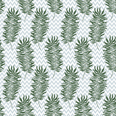 Seamless pattern with tropical palm leaves . Vector illustration.