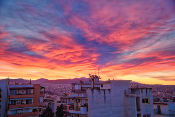 Fototapeta na wymiar sunrise over the buildings in a neighborhood of the city of Thessaloniki