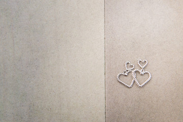 Two earring hearts on the swimming pool